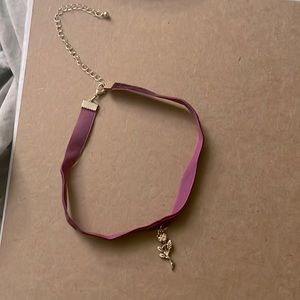 Dark purple velvet chocker with golden rose charm